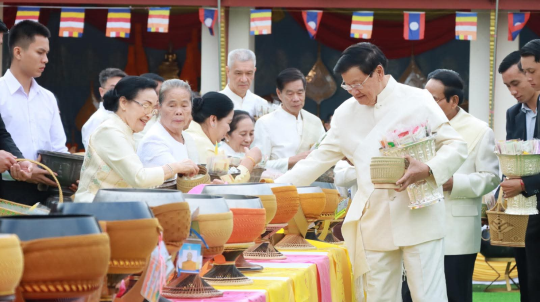President Thongloun Leads Almsgiving Ceremony at That Luang Festival